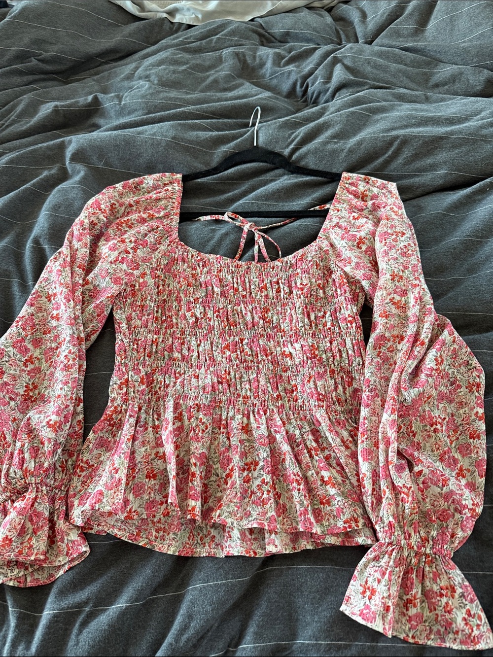 Floral Smocked Peplum Blouse from a boutique in Healdsburg CA.
